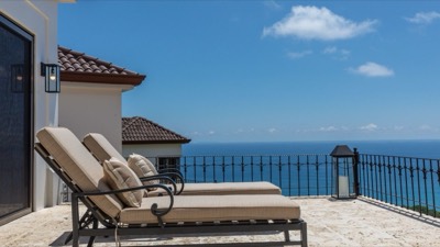 The loungers looking out to the Pacific
