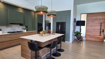 The kitchen island and its stools