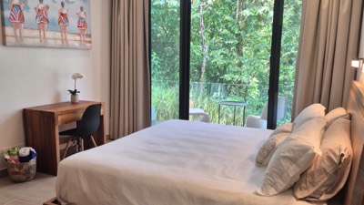 A bedroom opening onto the garden