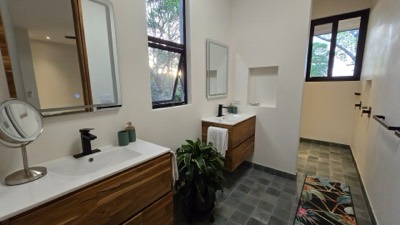 A bathroom with twin basins